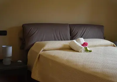 Letto o letti in una camera di La Casa di Abe