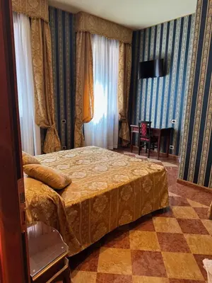 Letto o letti in una camera di Zulian V
