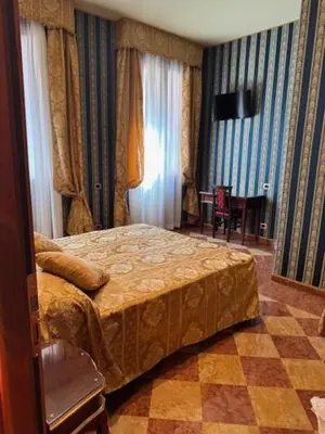 Letto o letti in una camera di Zulian V