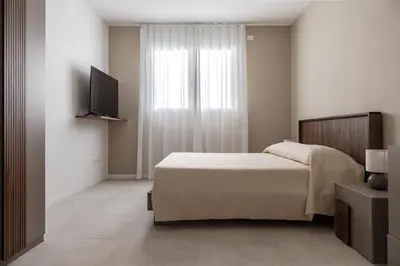Letto o letti in una camera di MINA Apartments
