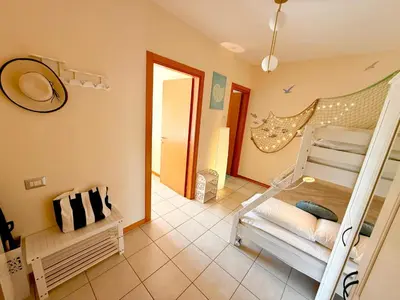 Letto o letti in una camera di Sandra