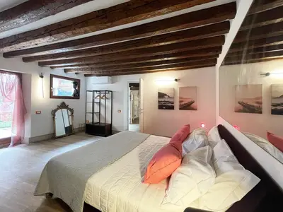 Letto o letti in una camera di Ca' Consorti ai Gesuiti - 2 bedrooms on the Lagoon stage