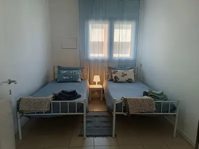 Letto o letti in una camera di L'appartamento casa Olena