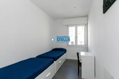 Letto o letti in una camera di Condominio Vittoria