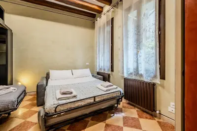 Letto o letti in una camera di Campiello Tron