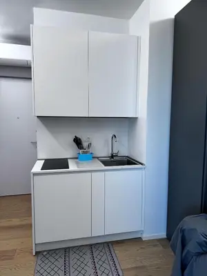Cucina o angolo cottura di La Torre Moderno Monolocale Fronte Mare