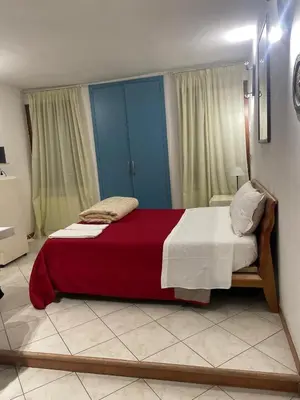 Letto o letti in una camera di Casa Biennale