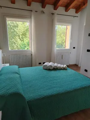 Letto o letti in una camera di Casa Rigai