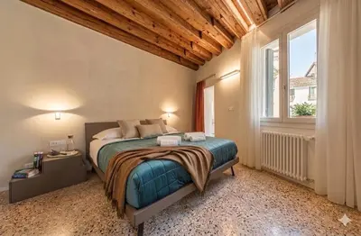 Letto o letti in una camera di San Tommaso Rialto Terrace Apt