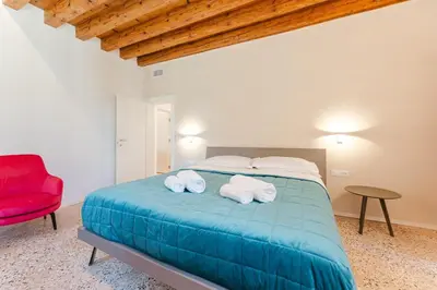 Letto o letti in una camera di San Tommaso Rialto Terrace Apt