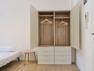 Letto o letti in una camera di Duomo Affascinante Monolocale