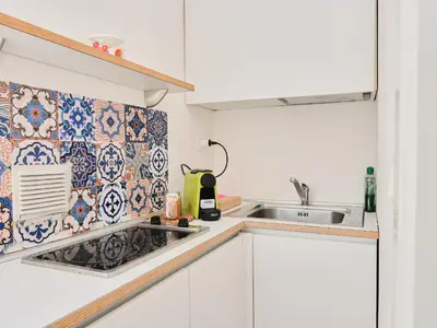 Cucina o angolo cottura di Duomo Affascinante Monolocale