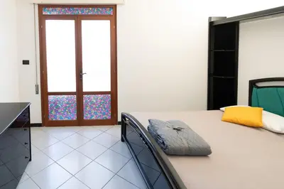 Letto o letti in una camera di Casa Maria