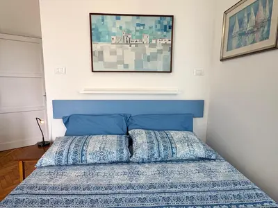 Letto o letti in una camera di Chez Tosca