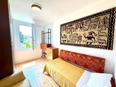 Letto o letti in una camera di Chez Tosca
