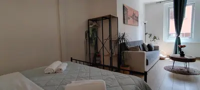 Letto o letti in una camera di Modern Apartment 15-min-to-Venice