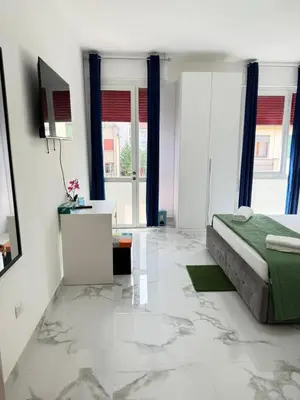 Letto o letti in una camera di REHAN VENICE STATiON
