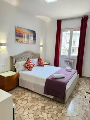 Letto o letti in una camera di REHAN VENICE STATiON