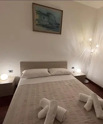 Letto o letti in una camera di Sweet charm in Venice