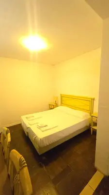 Letto o letti in una camera di Cà Dolce Vita