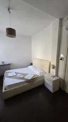 Letto o letti in una camera di Cà Dolce Vita