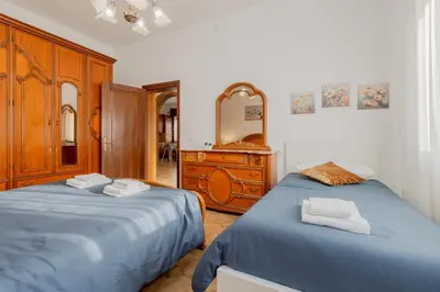 Letto o letti in una camera di MarcoPoloAirport4-Parking-Wifi-Netflix-PrimeVideo
