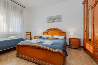 Letto o letti in una camera di MarcoPoloAirport4-Parking-Wifi-Netflix-PrimeVideo