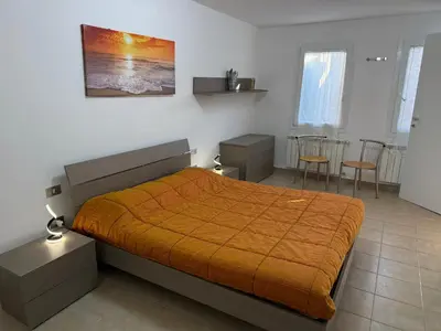 Letto o letti in una camera di Casa Torino