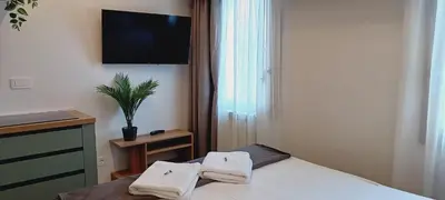 Letto o letti in una camera di Dimora Muneghette 181 ApartSuite House Chioggia