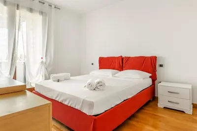 Letto o letti in una camera di GuestHost - Comfortable & Bright Apartment Mestre