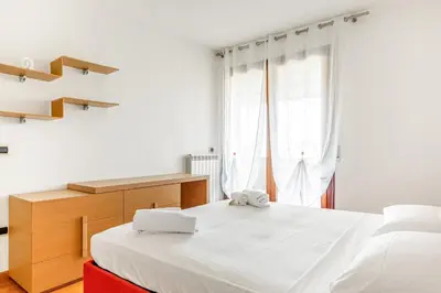 Letto o letti in una camera di GuestHost - Comfortable & Bright Apartment Mestre