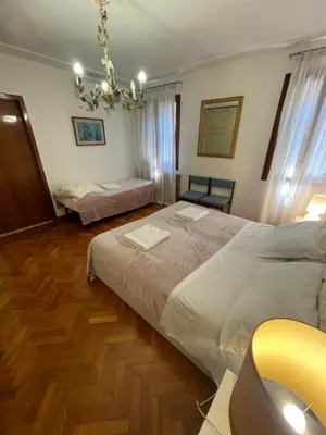 Letto o letti in una camera di Something else in Venice Kingsclass
