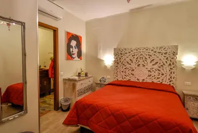 Letto o letti in una camera di Ca' del Cinema B&B
