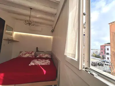 Letto o letti in una camera di casa dei pescatori sottomarina