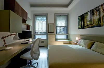 Letto o letti in una camera di Cà Murà - Residence Altinate