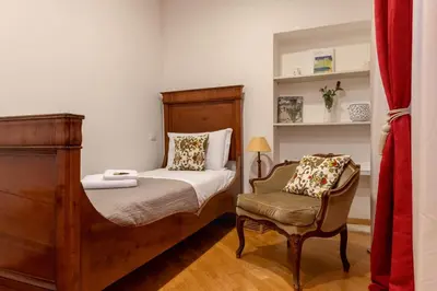 Letto o letti in una camera di Fenice Charme Canal View