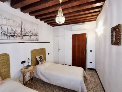 Letto o letti in una camera di Palazzo Soranzo