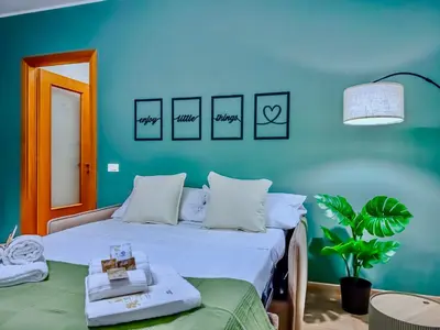 Letto o letti in una camera di Suite Deluxe di Design - Relax & Terme