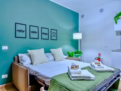 Letto o letti in una camera di Suite Deluxe di Design - Relax & Terme
