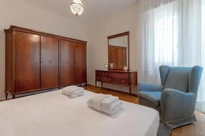 Letto o letti in una camera di Giulio Apartment-Train Station