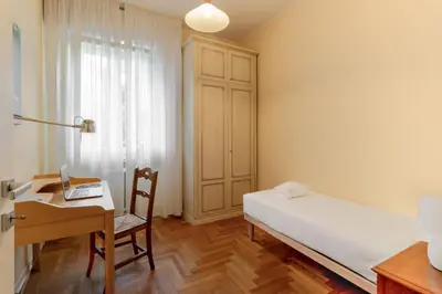 Letto o letti in una camera di Giulio Apartment-Train Station