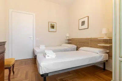 Letto o letti in una camera di Giulio Apartment-Train Station