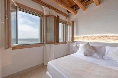 Letto o letti in una camera di Stravedo SUNSET