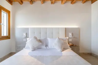 Letto o letti in una camera di Stravedo SUNSET