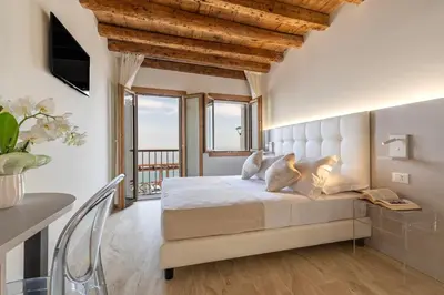 Letto o letti in una camera di Stravedo SUNSET