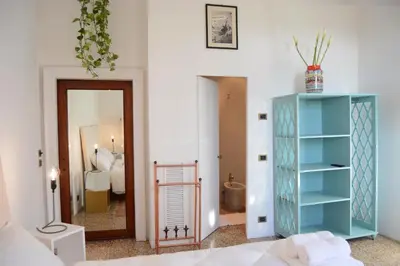 Letto o letti in una camera di B&B Giardino Jappelli (Villa Ca' Minotto)