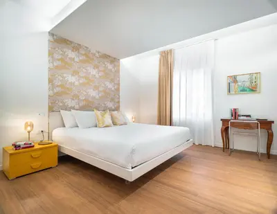 Letto o letti in una camera di Modern Apartment with View on San Giovanni e Paolo R&R