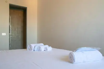 Letto o letti in una camera di Welc-ōM Toti Station Flat