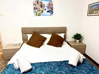 Letto o letti in una camera di Venice Mestre Train Station Apartment