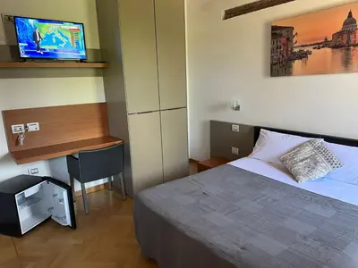 Letto o letti in una camera di Osteria Locanda Veneta